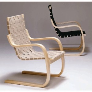 Armchair 406 prodotta da Artek.